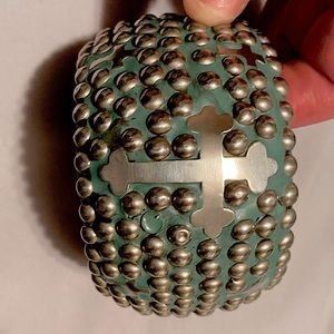 So cute teal cross bracelet from Buckle